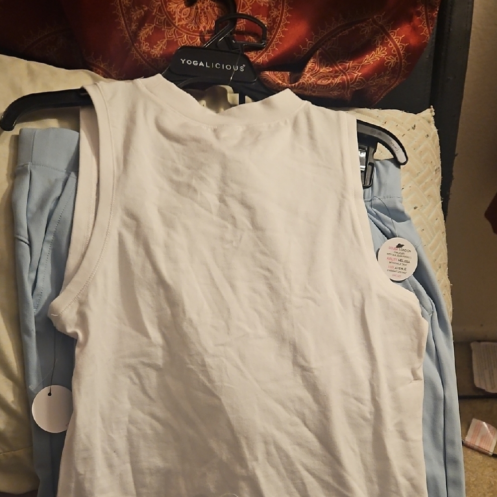 Yogalicious Classic White Sleeveless Top And Light Blue Bottoms